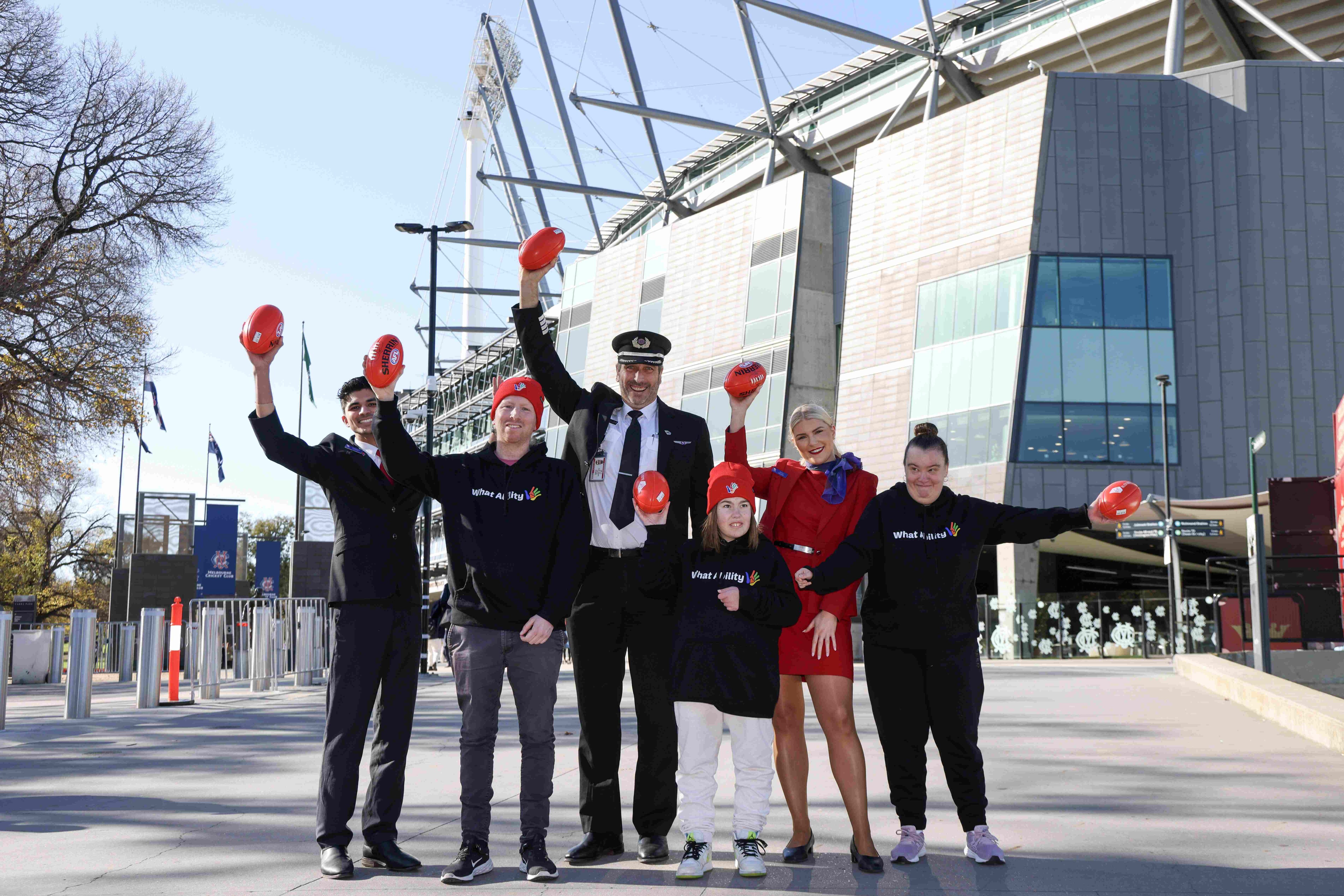Virgin Australia team supporting What Ability out the front of sporting event