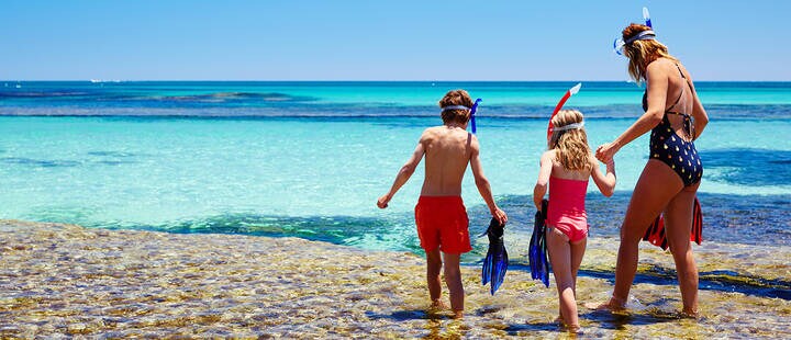 Mother with children snorkelling at The Basin, Rottnest Island